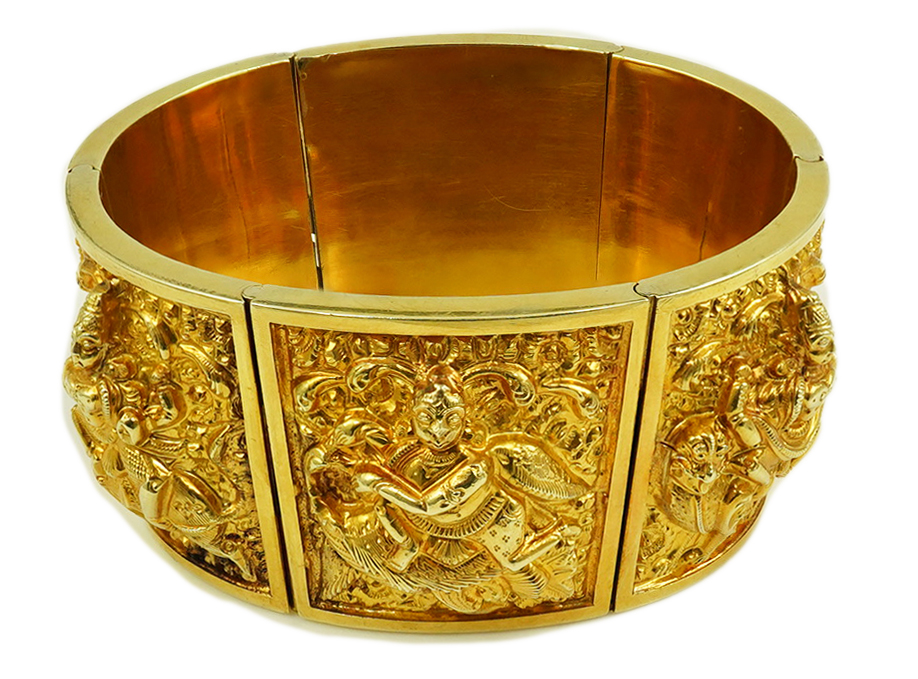 An early 20th century Indian gold hinged panelled cuff bracelet